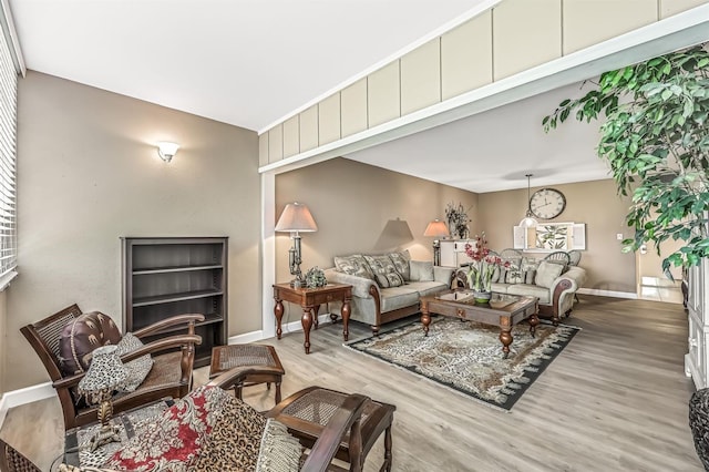 living room with light hardwood / wood-style flooring