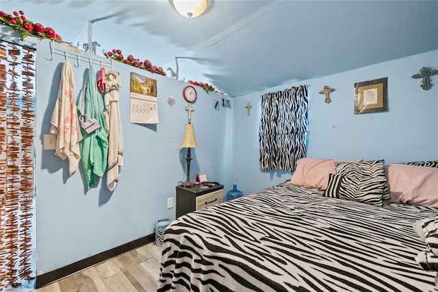 bedroom featuring light wood-type flooring