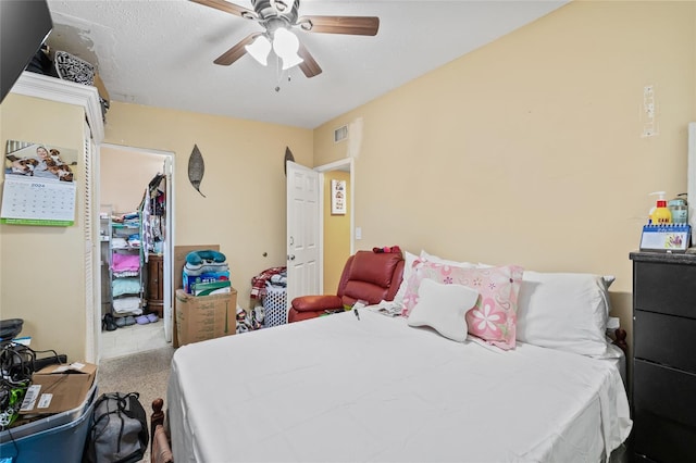 bedroom featuring ceiling fan and carpet floors