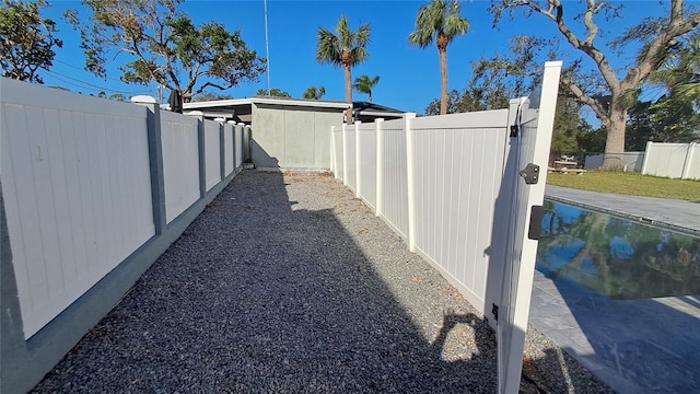 view of yard featuring a fenced in pool