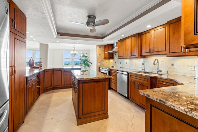 kitchen with decorative backsplash, wall chimney exhaust hood, stainless steel appliances, sink, and crown molding