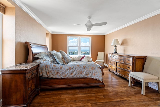 bedroom with dark wood-type flooring, crown molding, and ceiling fan