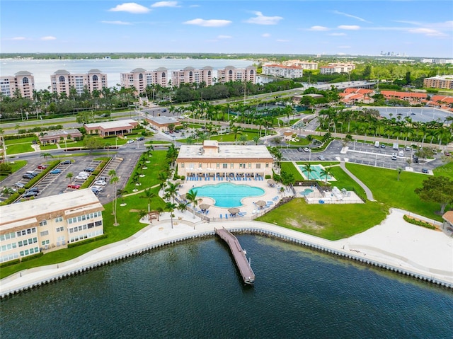 birds eye view of property featuring a water view