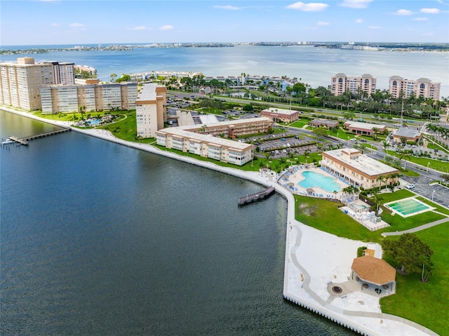 birds eye view of property featuring a water view