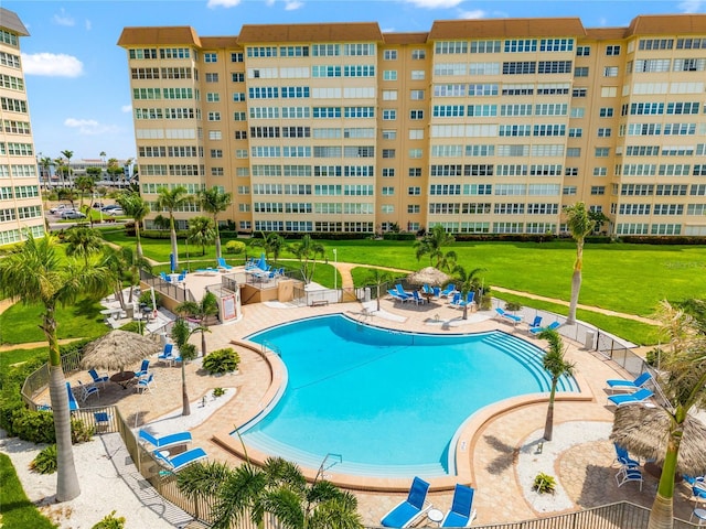 5200 Brittany Dr S Unit 1202, Saint Petersburg, FL 33715 - community pool featuring a patio