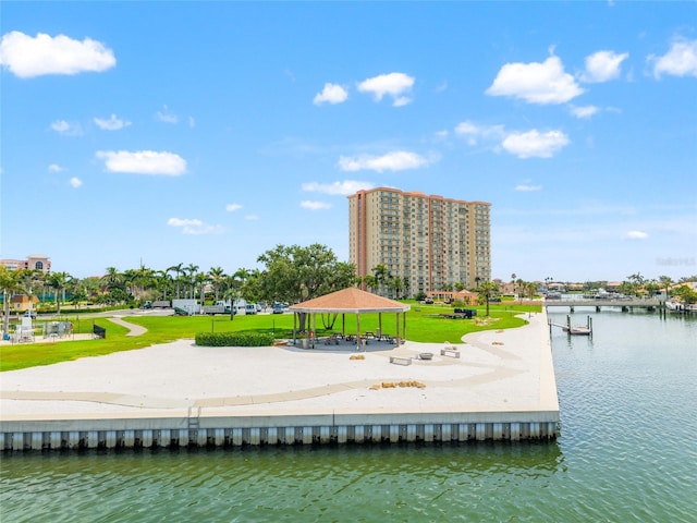 5200 Brittany Dr S Unit 1202, Saint Petersburg, FL 33715 - dock area featuring a gazebo, a water view, and a yard