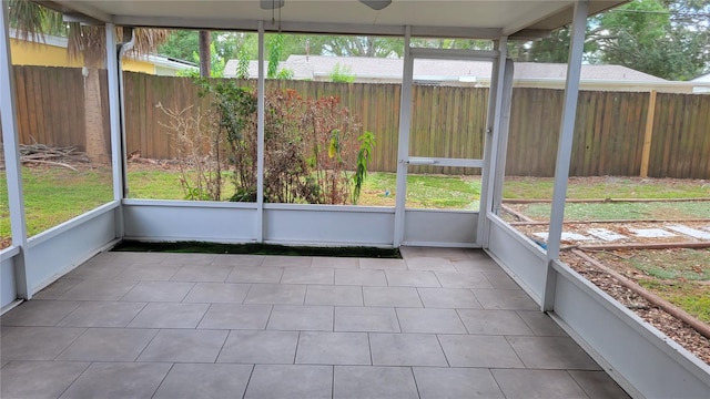 unfurnished sunroom with a healthy amount of sunlight