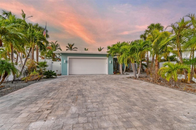 view of front of property featuring a garage