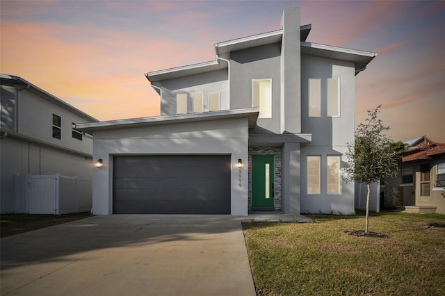 contemporary home featuring a lawn