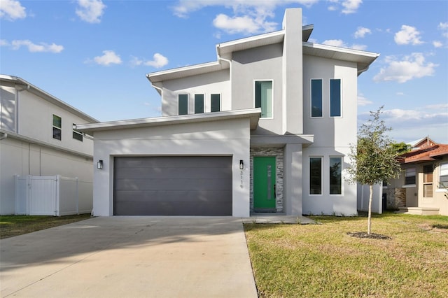 contemporary home with a front lawn