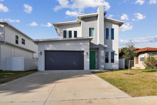 modern home featuring a front yard