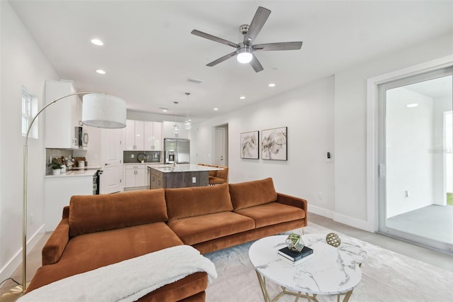 living room featuring ceiling fan