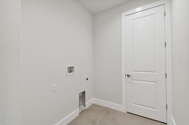 clothes washing area featuring hookup for an electric dryer, light tile patterned flooring, and washer hookup