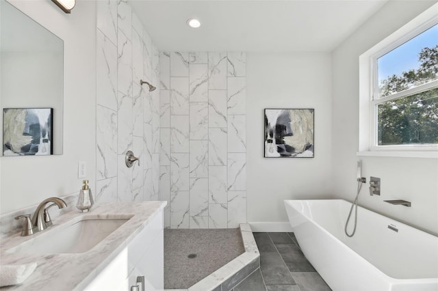 bathroom with vanity, independent shower and bath, and tile patterned floors