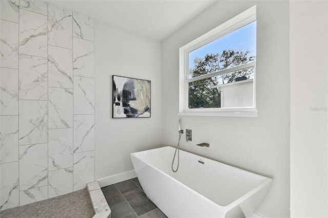 bathroom featuring a tub to relax in