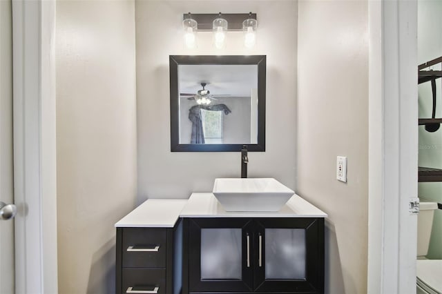 bathroom with vanity and ceiling fan