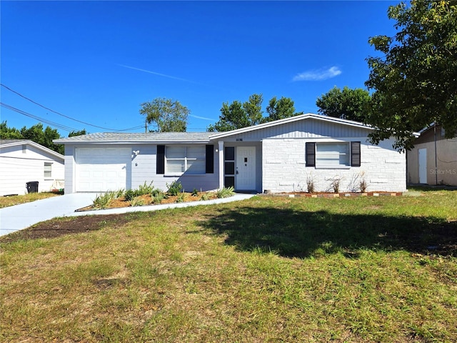 single story home featuring a front yard and a garage