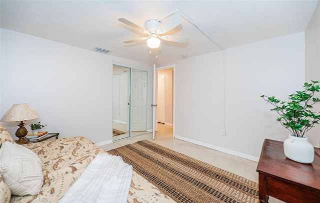 bedroom featuring a closet and ceiling fan