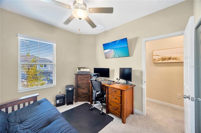 office area with light carpet and ceiling fan