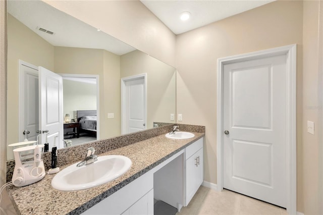 bathroom featuring vanity and tile patterned floors