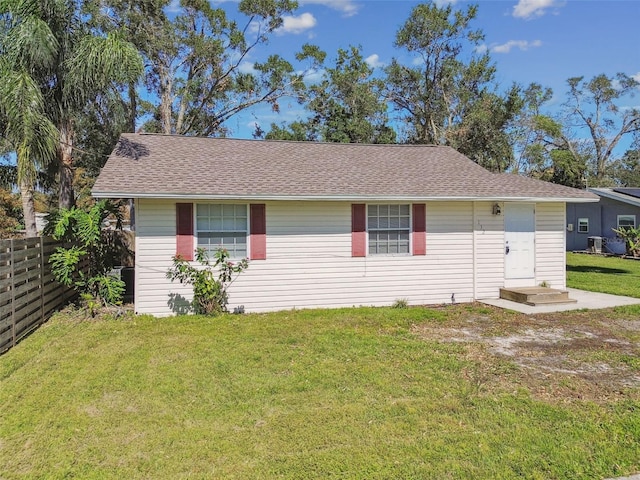 ranch-style home with a front yard