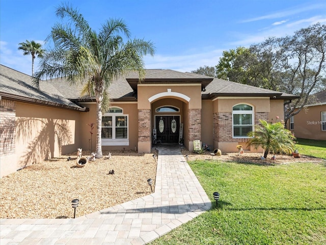 view of front of house with a front lawn