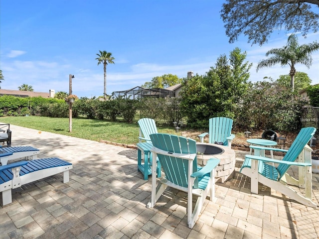 view of patio / terrace with a fire pit