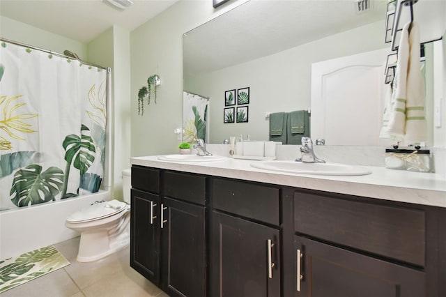 full bathroom featuring shower / bathtub combination with curtain, vanity, tile patterned floors, and toilet