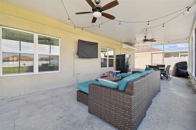 view of patio with an outdoor hangout area and ceiling fan