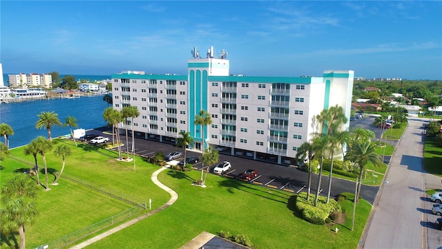 birds eye view of property featuring a water view