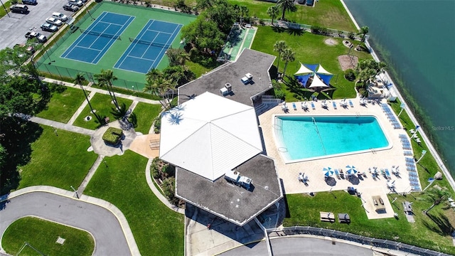 birds eye view of property featuring a water view