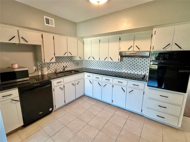 kitchen with sink, black appliances, and white cabinets