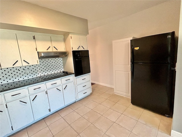 kitchen featuring white cabinetry, black appliances, and light tile patterned flooring