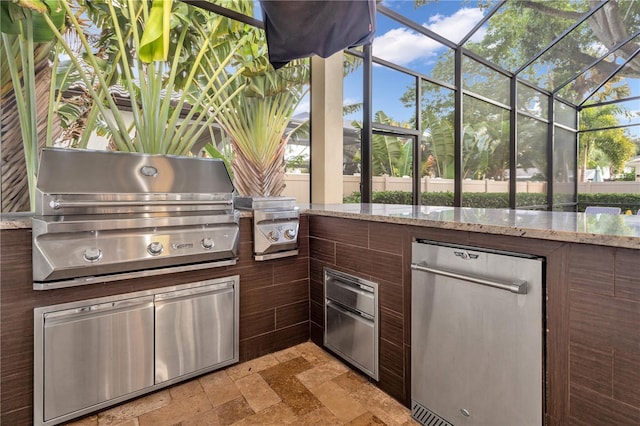 view of patio featuring area for grilling and a grill