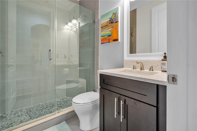 bathroom with vanity, an enclosed shower, tile patterned floors, and toilet