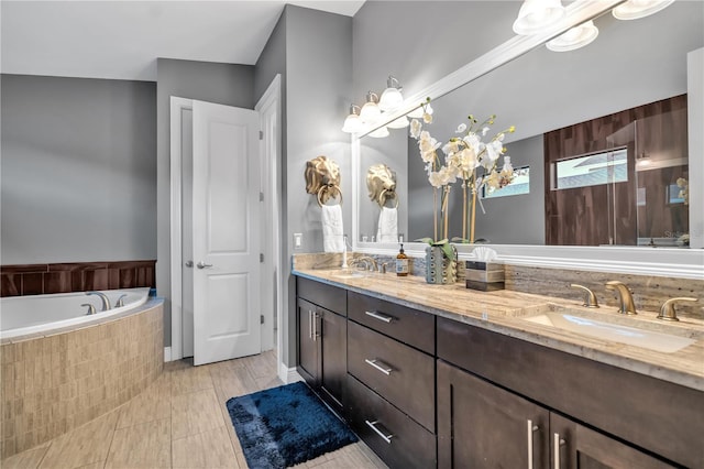 bathroom featuring vanity and plus walk in shower