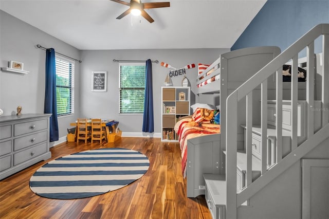 bedroom with hardwood / wood-style flooring and ceiling fan