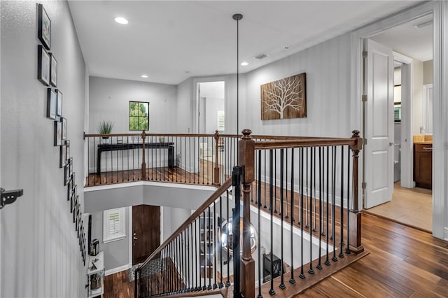 stairway with wood-type flooring