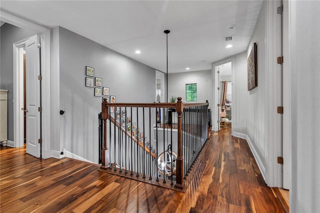 hall featuring dark wood-type flooring