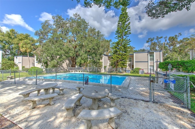 view of pool featuring a patio