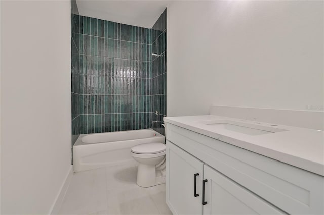 full bathroom with toilet, tiled shower / bath, vanity, and tile patterned flooring