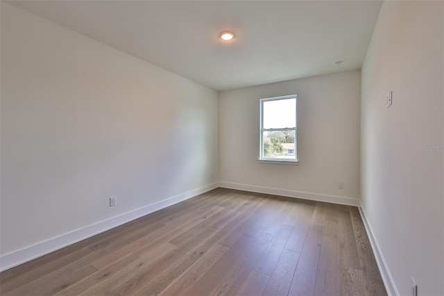 spare room with light wood-type flooring