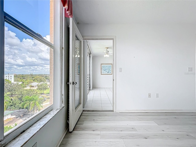 spare room featuring light wood-type flooring