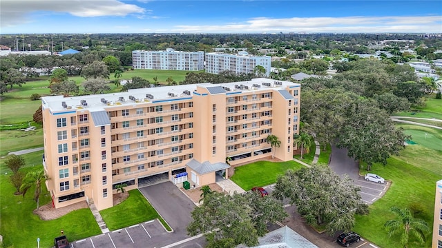 birds eye view of property featuring golf course view