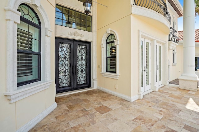 doorway to property featuring french doors