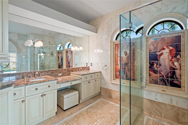 bathroom with vanity, tile patterned floors, and an enclosed shower