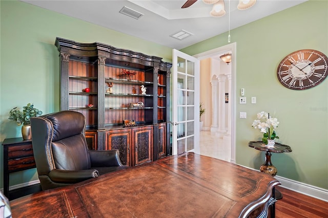 office featuring hardwood / wood-style flooring and ceiling fan