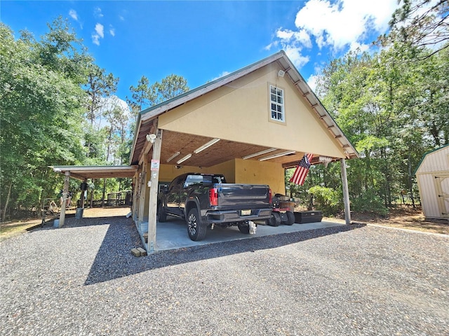 view of parking / parking lot with a carport