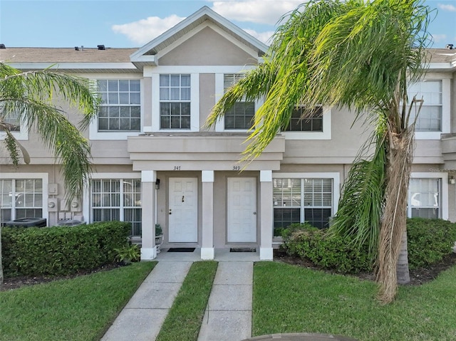 view of front of house with a front lawn