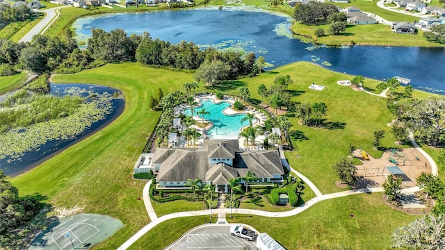 birds eye view of property featuring a water view